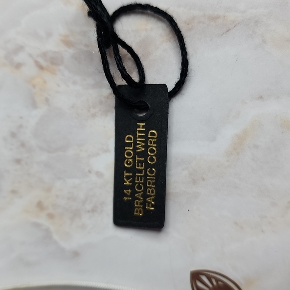 14k gold evil eye hamsa bracelet with fabric cord made in Italy - Picture 4 of 6